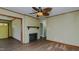 Neutral living room with fireplace, hardwood floors, and wood trim accents at 761 S Eighth St, Mebane, NC 27302