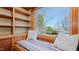 Cozy window seat with a cushioned bench, providing a comfortable reading nook and natural light at 761 S Eighth St, Mebane, NC 27302