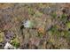 Gorgeous aerial view of home surrounded by mature landscaping, creating a private and serene environment at 7917 Holly Springs Rd, Raleigh, NC 27606