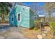 Charming home showcasing a side view with attractive siding, side porch and mature landscaping at 810 Cox Ave, Durham, NC 27701