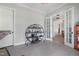 Hallway view with bar cart and open doorway beyond at 83 Inspiration Way, Fuquay Varina, NC 27526