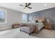 Main bedroom with accent wall and windows at 83 Inspiration Way, Fuquay Varina, NC 27526