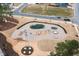 Aerial view of playground with swings, slides, and a windmill feature at 83 Inspiration Way, Fuquay Varina, NC 27526