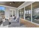 Relaxing screened-in porch with comfortable seating and outdoor views at 83 Inspiration Way, Fuquay Varina, NC 27526