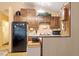 Cozy kitchen space offering plenty of cabinet storage above and below countertops at 911 Williams Rd, Raleigh, NC 27610
