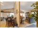 Living room featuring an inviting dining area and ample natural light at 911 Williams Rd, Raleigh, NC 27610