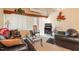 Comfortable living room featuring dual sofas, plush carpeting, and bright natural light at 911 Williams Rd, Raleigh, NC 27610