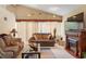 Well-lit living room featuring stylish decor and a cozy fireplace at 911 Williams Rd, Raleigh, NC 27610