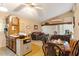 Comfortable living area with a dining table and kitchen in the background at 911 Williams Rd, Raleigh, NC 27610