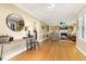 Bright and airy living room featuring hardwood floors, fireplace, and ample natural light at 105 Blanchard St, Fuquay Varina, NC 27526