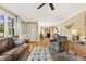 Inviting living room with hardwood floors, elegant trim, and comfortable seating arrangement at 105 Blanchard St, Fuquay Varina, NC 27526