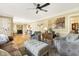 Spacious living room featuring hardwood floors, decorative trim and neutral paint at 105 Blanchard St, Fuquay Varina, NC 27526