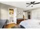 Spacious bedroom with ensuite bathroom access, hardwood floors, and closet space at 105 Blanchard St, Fuquay Varina, NC 27526