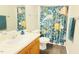 This bathroom features a dinosaur-themed shower curtain, adding a playful touch to the space at 105 Cherry Grove Dr, Cary, NC 27519