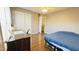 Comfortable bedroom with closet space and a dedicated desk area at 105 Cherry Grove Dr, Cary, NC 27519