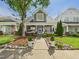 Charming two-story home with a welcoming front porch and well-manicured landscaping at 10836 Connally Ln, Raleigh, NC 27614