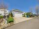 Detached two-car garage, providing ample parking with a spacious paved driveway and curbside appeal at 10836 Connally Ln, Raleigh, NC 27614