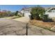 Spacious detached garage offering ample parking with an extended driveway and convenient street access at 10836 Connally Ln, Raleigh, NC 27614