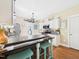 Modern kitchen featuring a granite island, stainless steel appliances, and light cabinetry at 10836 Connally Ln, Raleigh, NC 27614