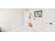 Bright, open room with neutral walls, carpet and trim. Interior door is open, leading to another room at 10836 Connally Ln, Raleigh, NC 27614