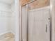 Bathroom with a glass enclosed tiled shower at 11003 Louson Pl, Raleigh, NC 27614