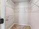 Spacious walk-in closet with shelving units at 11003 Louson Pl, Raleigh, NC 27614