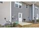 This backyard features a cozy patio with grill, perfect for outdoor entertaining, plus easy lawn maintenance at 1107 Pale Moss Dr, Durham, NC 27704