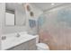 Bathroom with vanity, toilet, mirror, and shower with stylish curtain at 1107 Pale Moss Dr, Durham, NC 27704