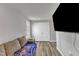Inviting living room featuring a comfortable couch, TV, and neutral color palette at 1107 Pale Moss Dr, Durham, NC 27704