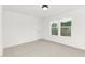 Cozy bedroom with a neutral color palette and large windows allowing natural light indoors at 111 Silver Moon Ln # 121, Clayton, NC 27527