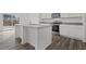 Kitchen with stainless steel appliances and a view of the outdoor patio at 1114 Centerview Drive, Nashville, NC 27856
