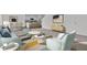 Bright, open living space featuring modern furnishings and a seamless flow to the kitchen and dining areas at 1114 Centerview Drive, Nashville, NC 27856