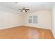 Bright bedroom features a ceiling fan and a window that brings in natural light at 115 Pecan Harvest Dr, Garner, NC 27529