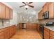 Spacious kitchen featuring stainless steel appliances, granite countertops, and a view of the open floor plan at 115 Pecan Harvest Dr, Garner, NC 27529