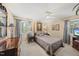 Cozy bedroom with decorative bedding, complemented by elegant curtains, creating a warm and inviting space at 11801 Strickland Rd, Raleigh, NC 27613