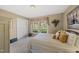 Cozy bedroom with a comfortable bed, closet, and bright window at 11801 Strickland Rd, Raleigh, NC 27613
