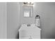 Clean bathroom with a modern vanity, mirror, and stylish fixtures at 1248 Jamestown Ct, Cary, NC 27511