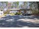 Street view of home with a parking lot at 1248 Jamestown Ct, Cary, NC 27511