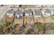 This is an overhead shot showing the neighborhood featuring mature trees and well-manicured lawns at 1408 Weavers Trace Dr, Zebulon, NC 27597