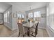 Bright dining area filled with natural light, a modern table set, and stylish decor accents at 1408 Weavers Trace Dr, Zebulon, NC 27597