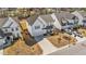Beautiful two-story home boasts a manicured lawn, inviting front porch, and attached two-car garage at 1408 Weavers Trace Dr, Zebulon, NC 27597