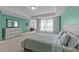 Spacious primary bedroom features ample natural light, carpet flooring and an open-concept layout at 1408 Weavers Trace Dr, Zebulon, NC 27597