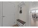 Functional mudroom with built-in shelving, bench, and convenient storage solutions at 1408 Weavers Trace Dr, Zebulon, NC 27597