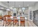 Eat-in kitchen featuring pendant lighting, stainless appliances and bar seating at 147 Glenpark Pl, Cary, NC 27511