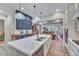 Spacious open-concept kitchen with island, stainless steel appliances, and bar seating at 147 Glenpark Pl, Cary, NC 27511