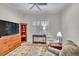 Cozy living room with hardwood floors, ceiling fan and plenty of natural light at 147 Glenpark Pl, Cary, NC 27511
