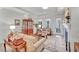 Bright living room featuring a fireplace, hardwood floors, and natural lighting at 147 Glenpark Pl, Cary, NC 27511