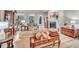 Comfortable living room with fireplace, hardwood floors, and ample seating at 147 Glenpark Pl, Cary, NC 27511