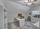 Bright, airy office space with built-in shelving, modern desk, and ample natural light at 147 Glenpark Pl, Cary, NC 27511