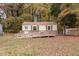 Charming home with wheelchair ramp, siding and small fenced yard at 164 Torain St, Hillsborough, NC 27278